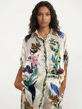 Oversized blouse with a sophisticated print