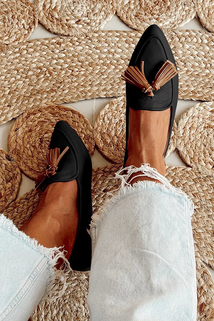 Loafer boots with pom-poms
