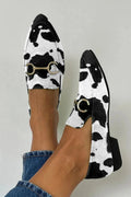 Polka dot loafer boots with a gold clip