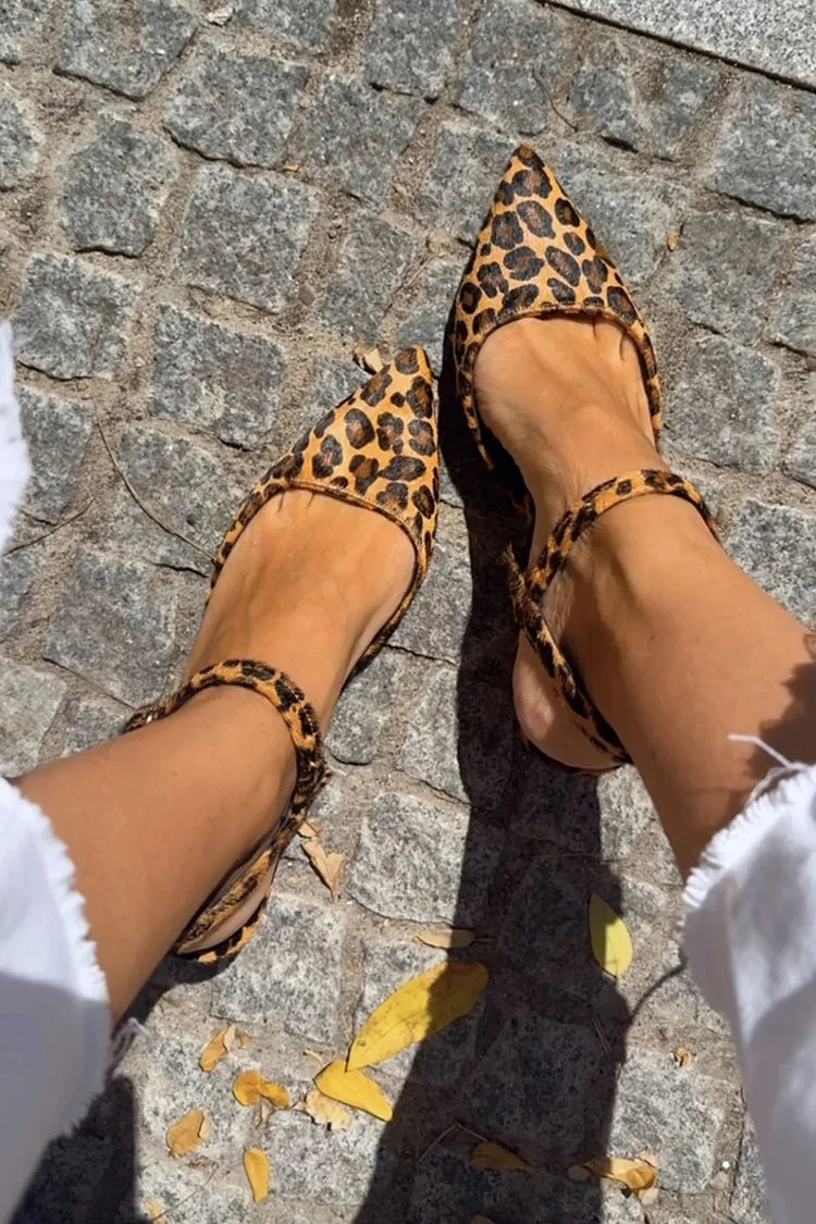 Pointed ballet flats with a strap