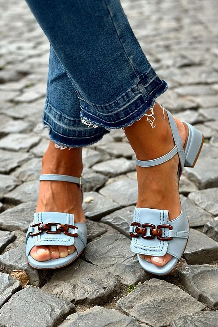 Sandals with chain details
