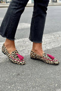 Loafer boots with animal print and fuchsia pompom