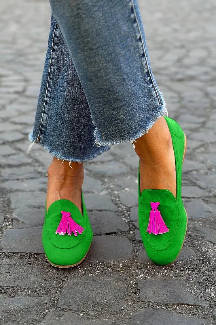 Green loafers with fuchsia tips