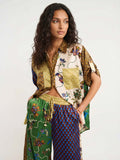 Button-down shirt with contrast bird print