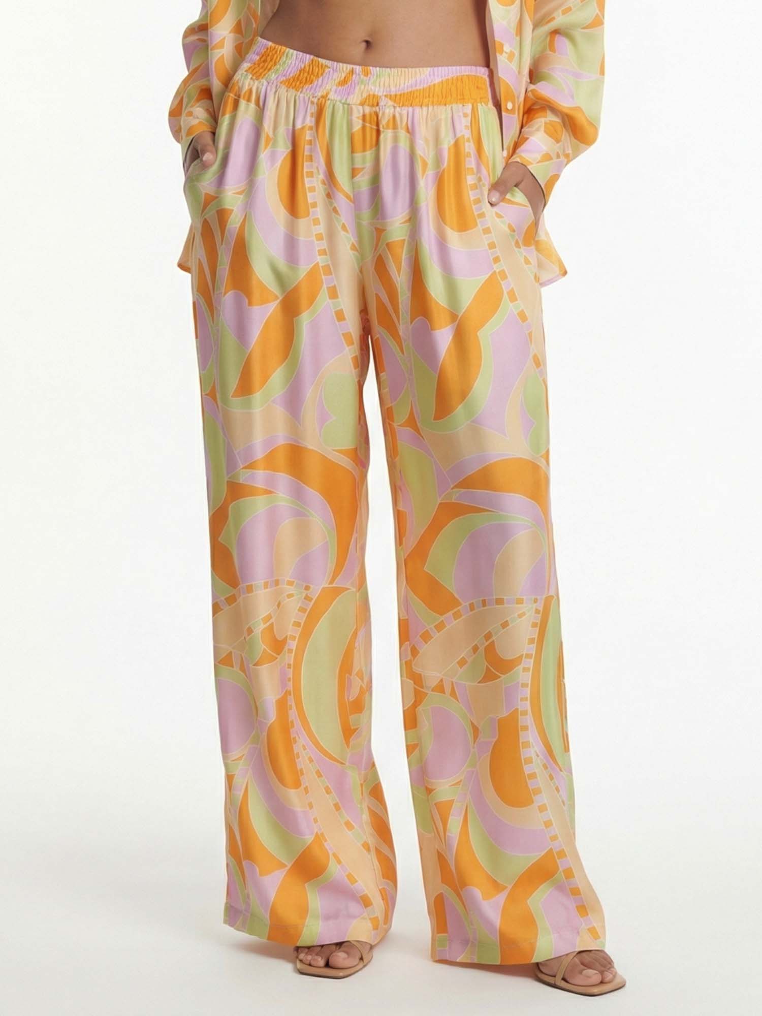 Wide-leg trousers with tropical beach graphic print
