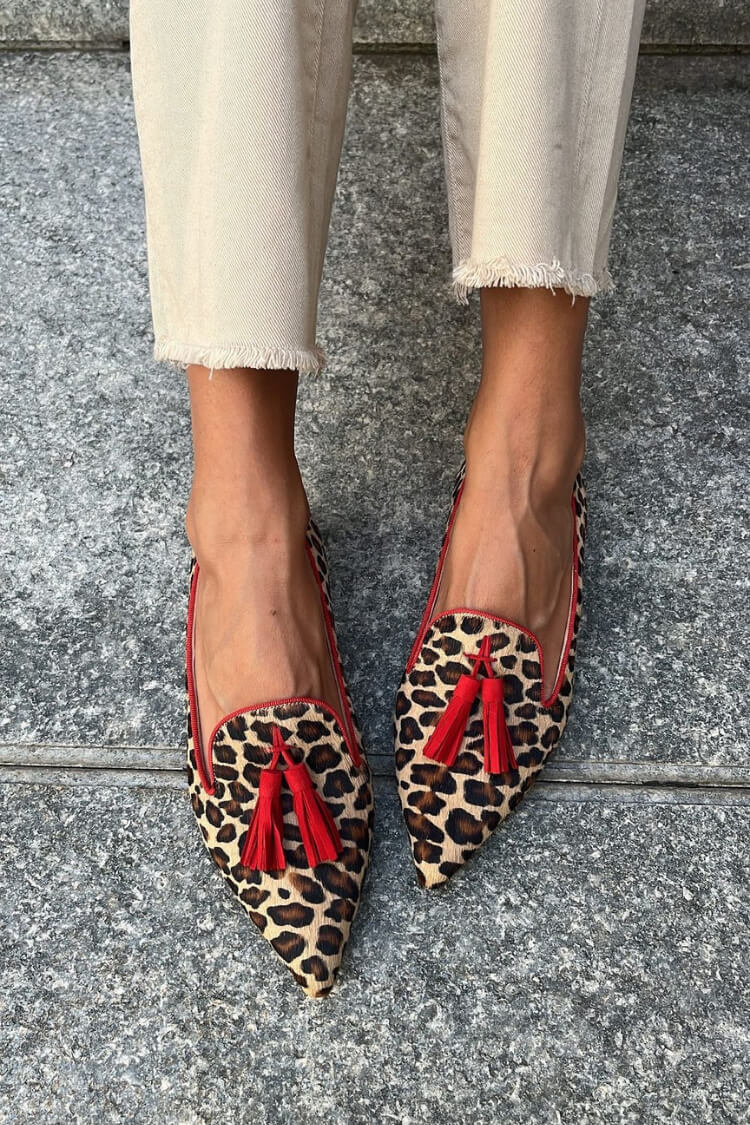 Loafer boots with fringe details