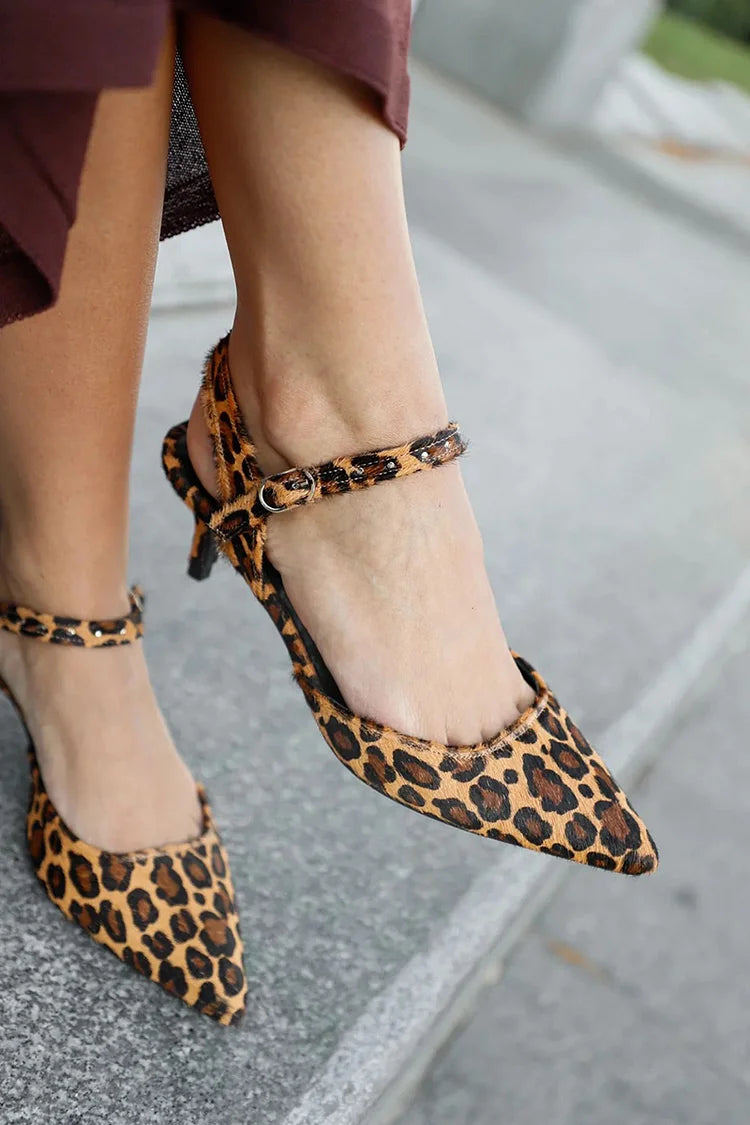 Pointed ballet flats with a strap