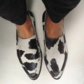 Cow print boots