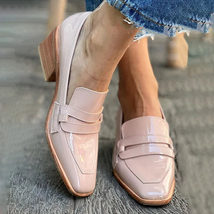 Shiny wide-heeled loafer boots