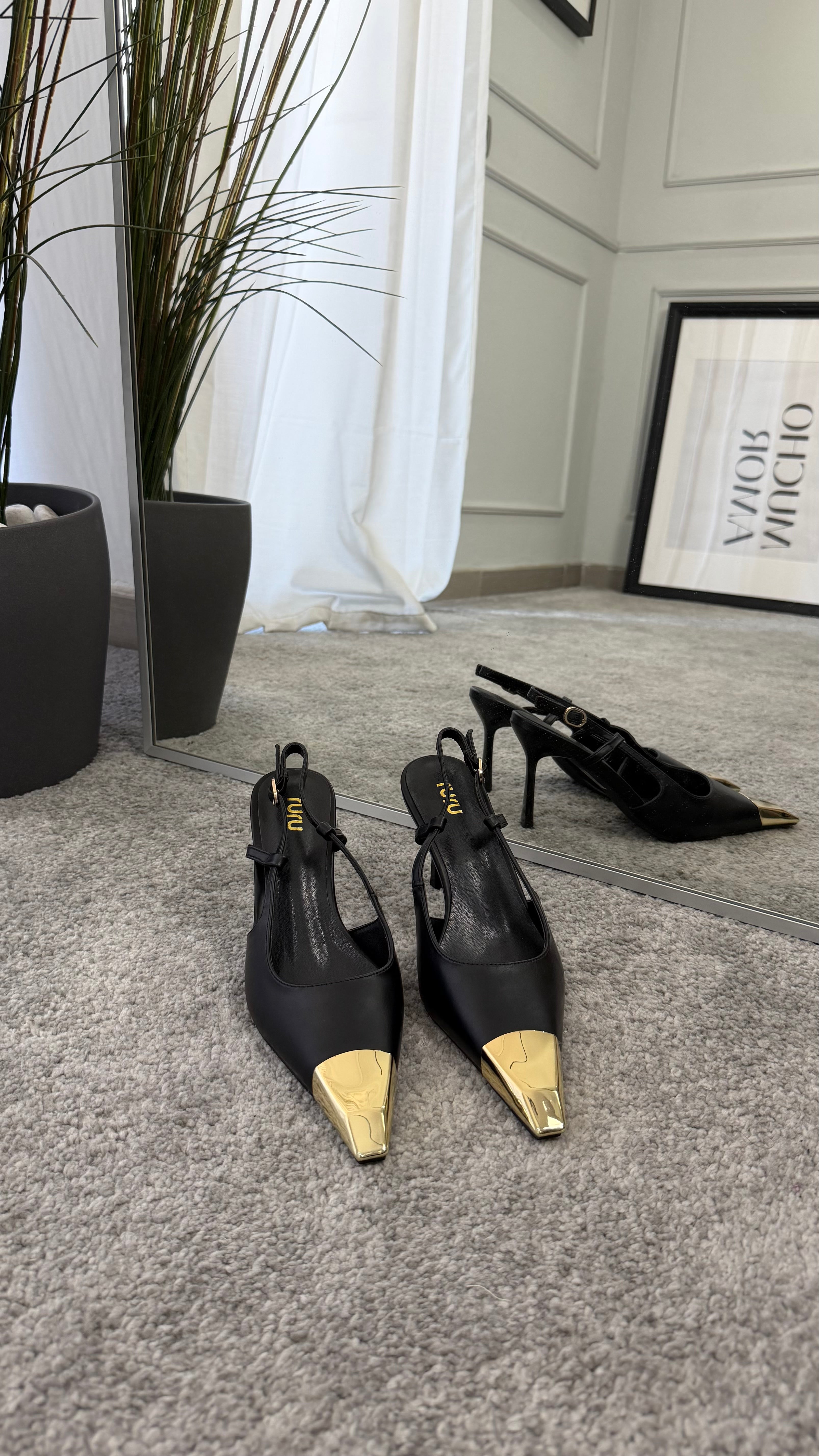 Slingback with gold toe cap