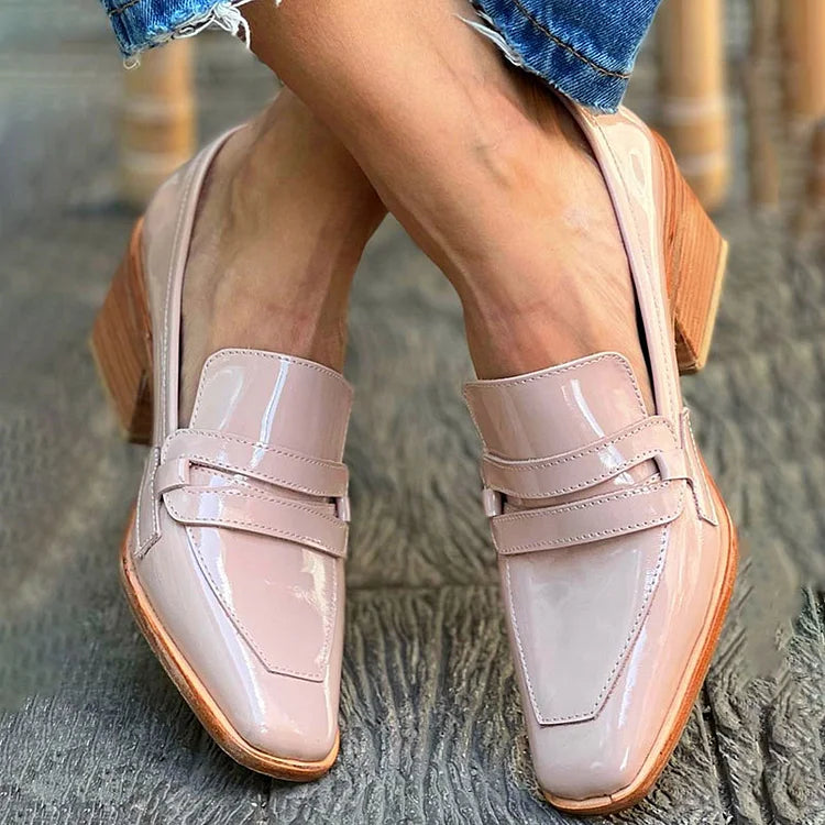 Shiny wide-heeled loafer boots