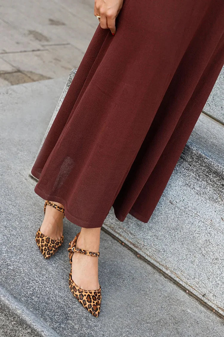 Pointed ballet flats with a strap