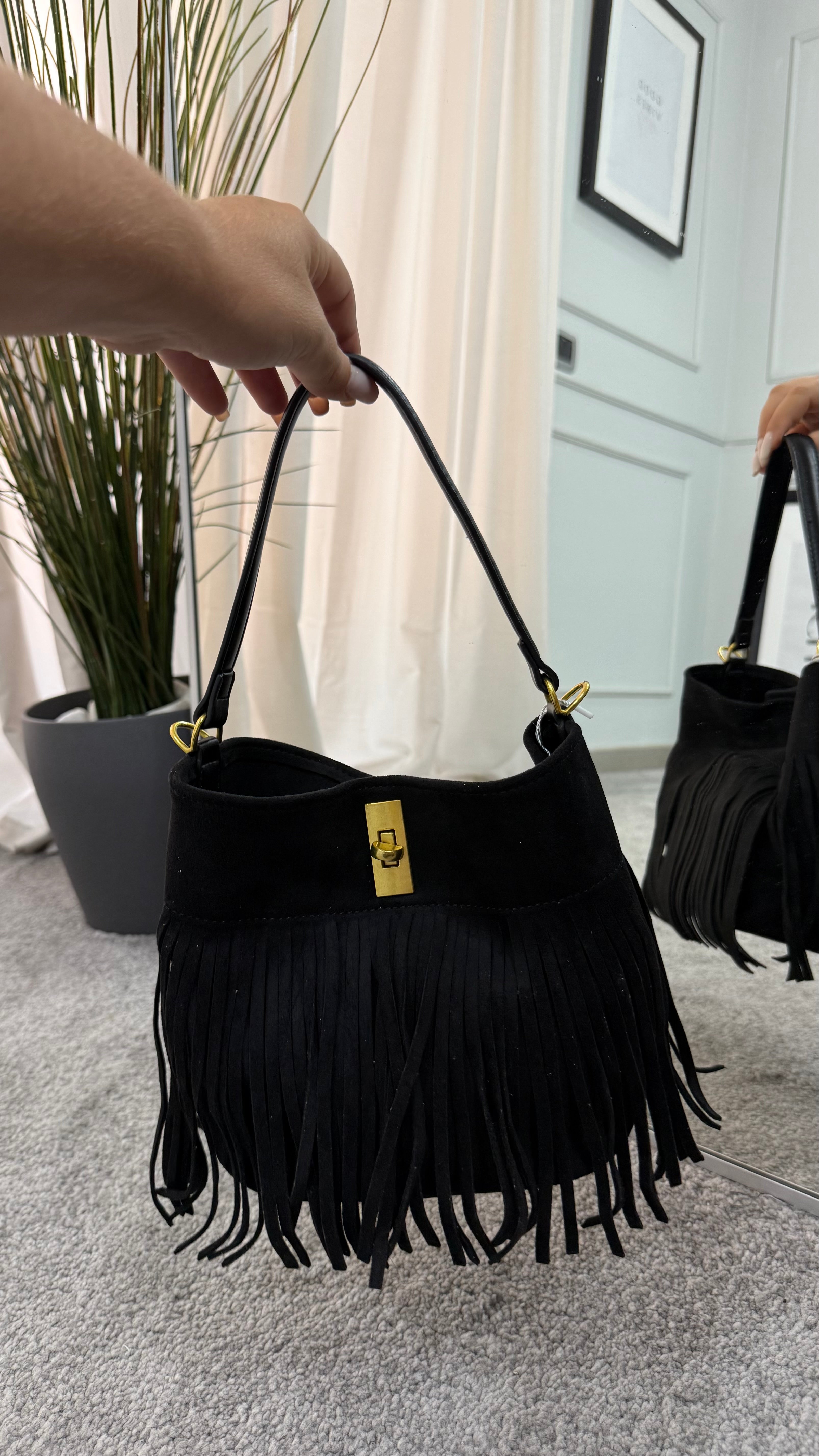 Suede bag with bows