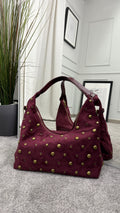 Suede bag with studs