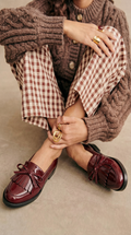 Fringe boot with arch
