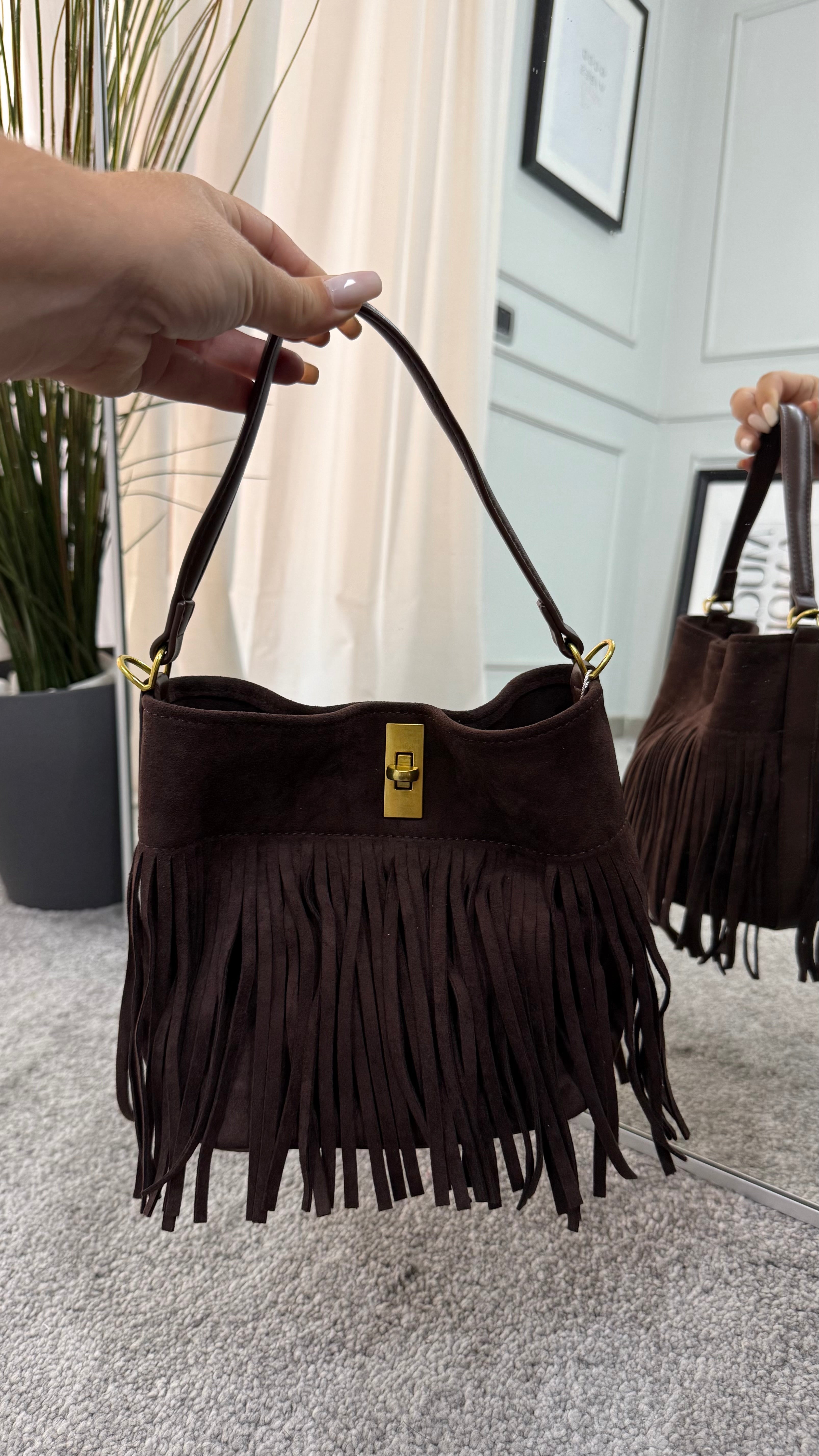 Suede bag with bows