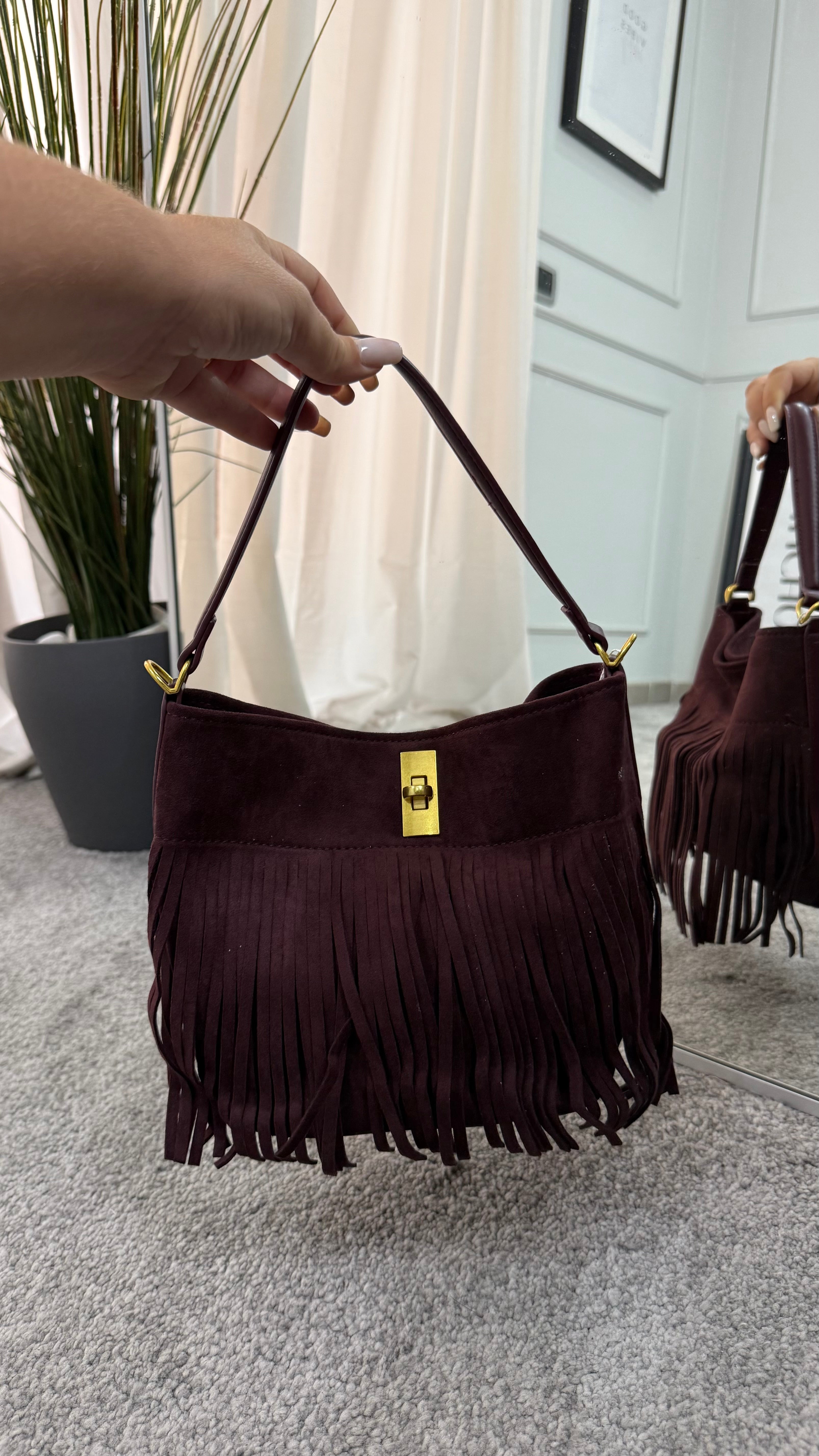 Suede bag with bows