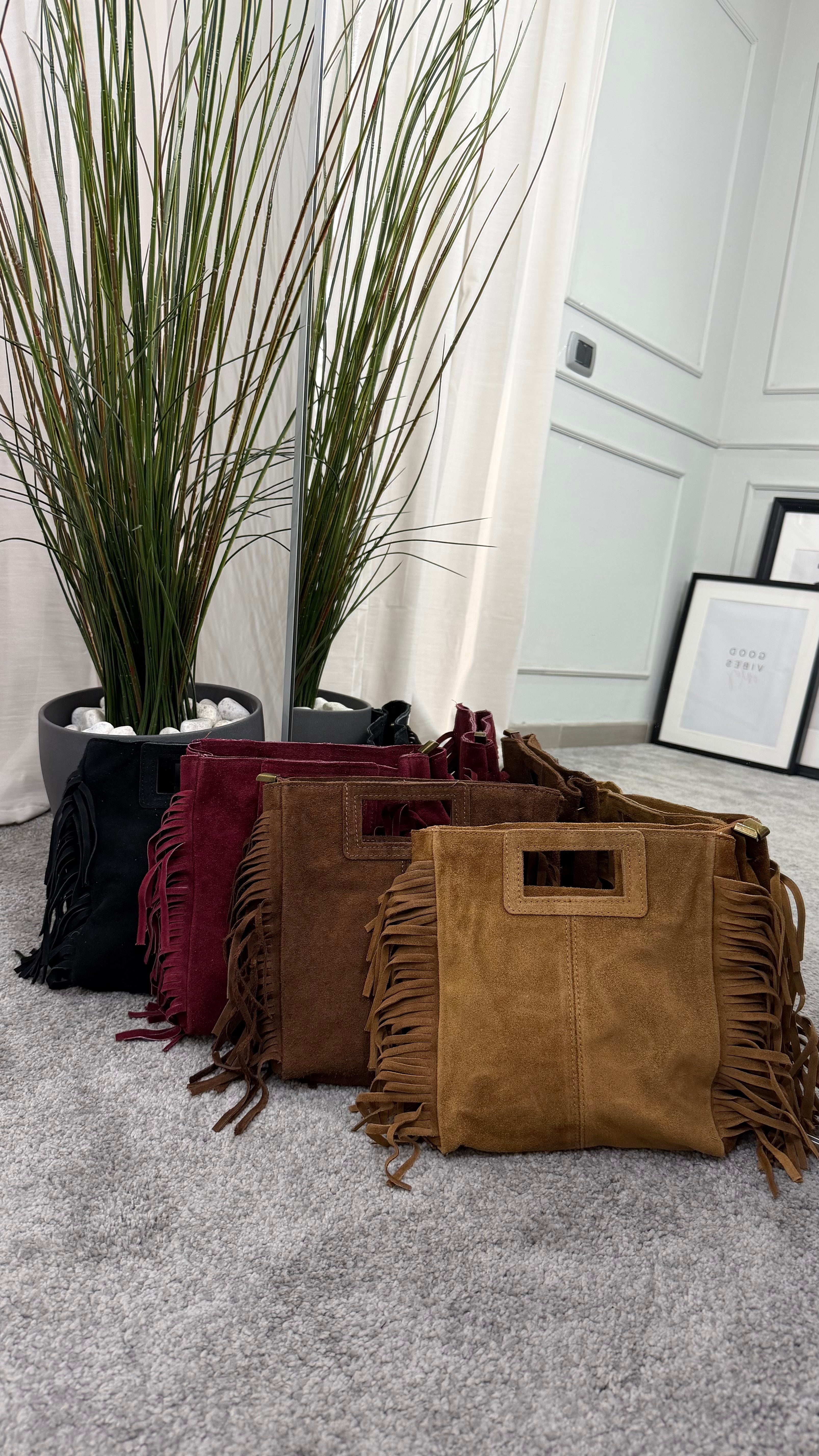 Suede bag with tassels