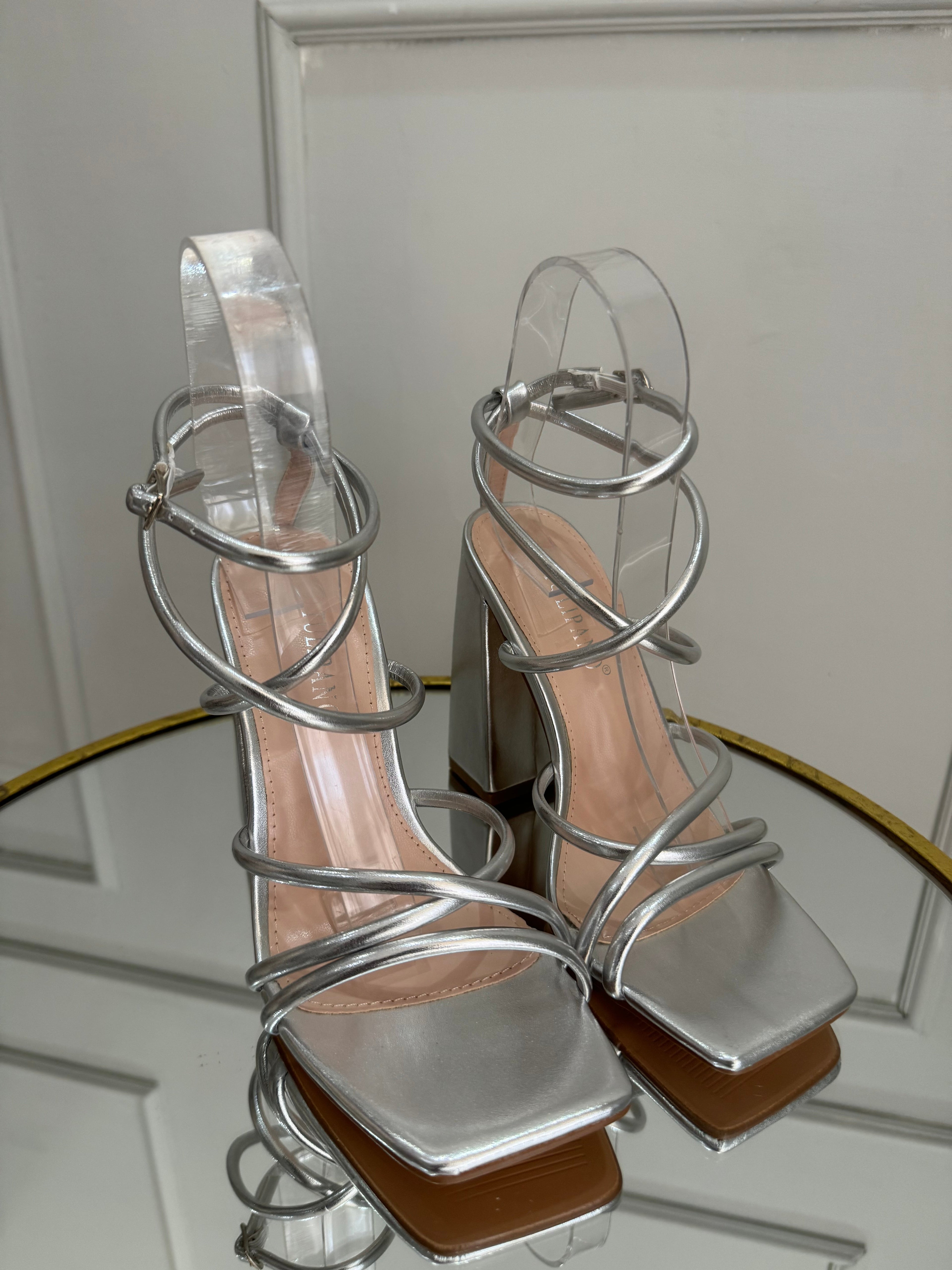 Silver sandal with a block heel