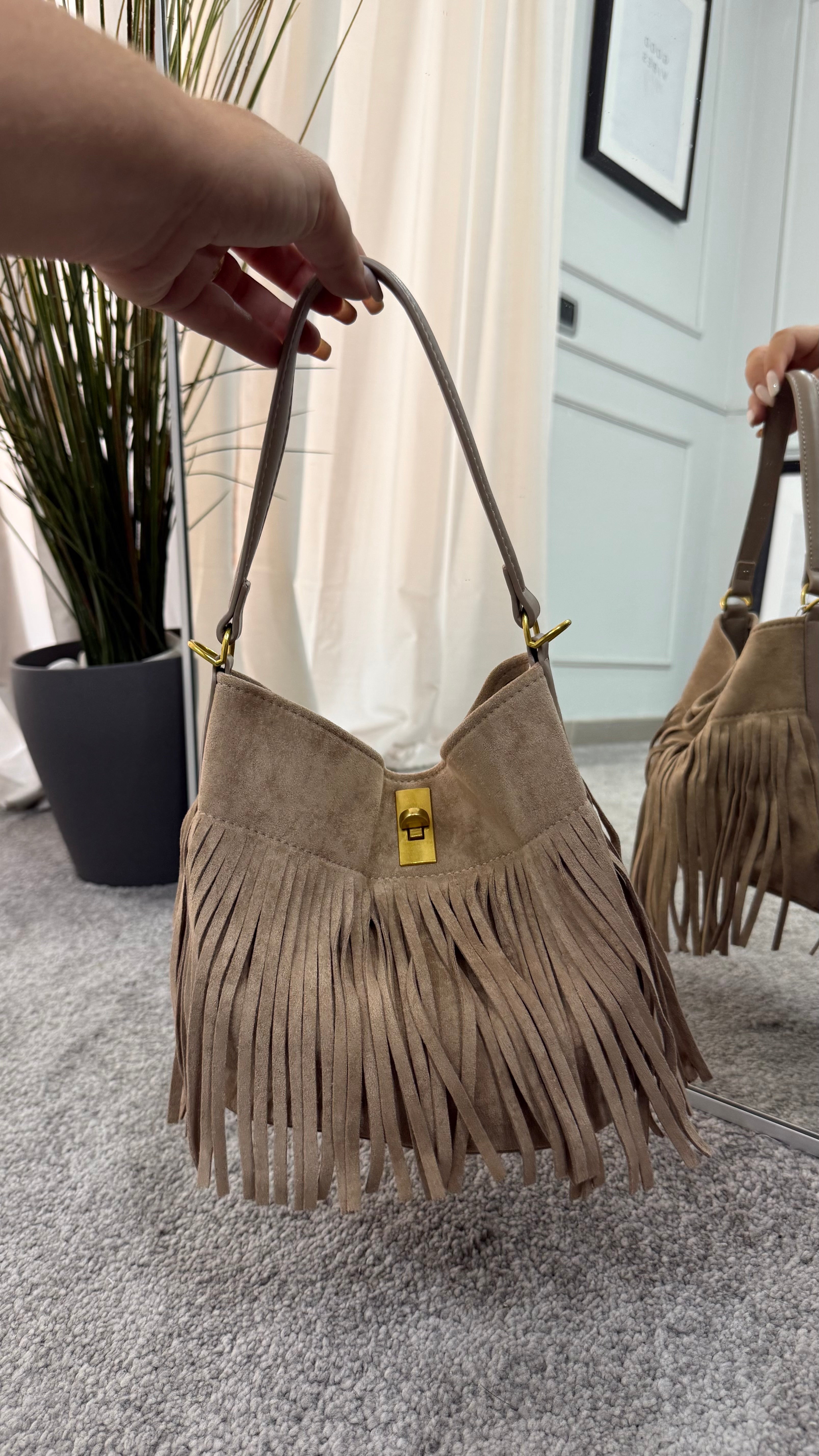 Suede bag with bows