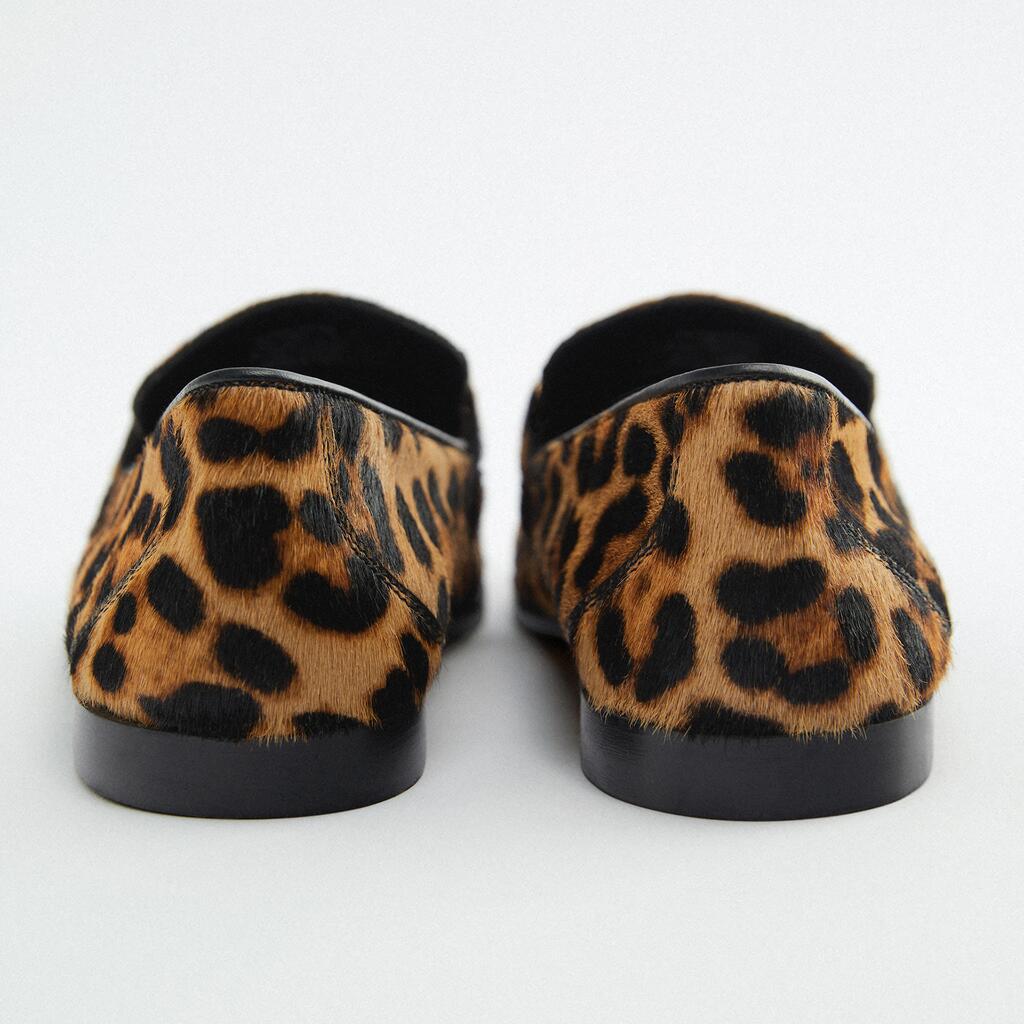 Loafer boots with animal print and metallic detail