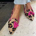 Ballerina flats with animal print and elegant pom-poms