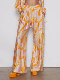 Wide-leg trousers with tropical beach graphic print