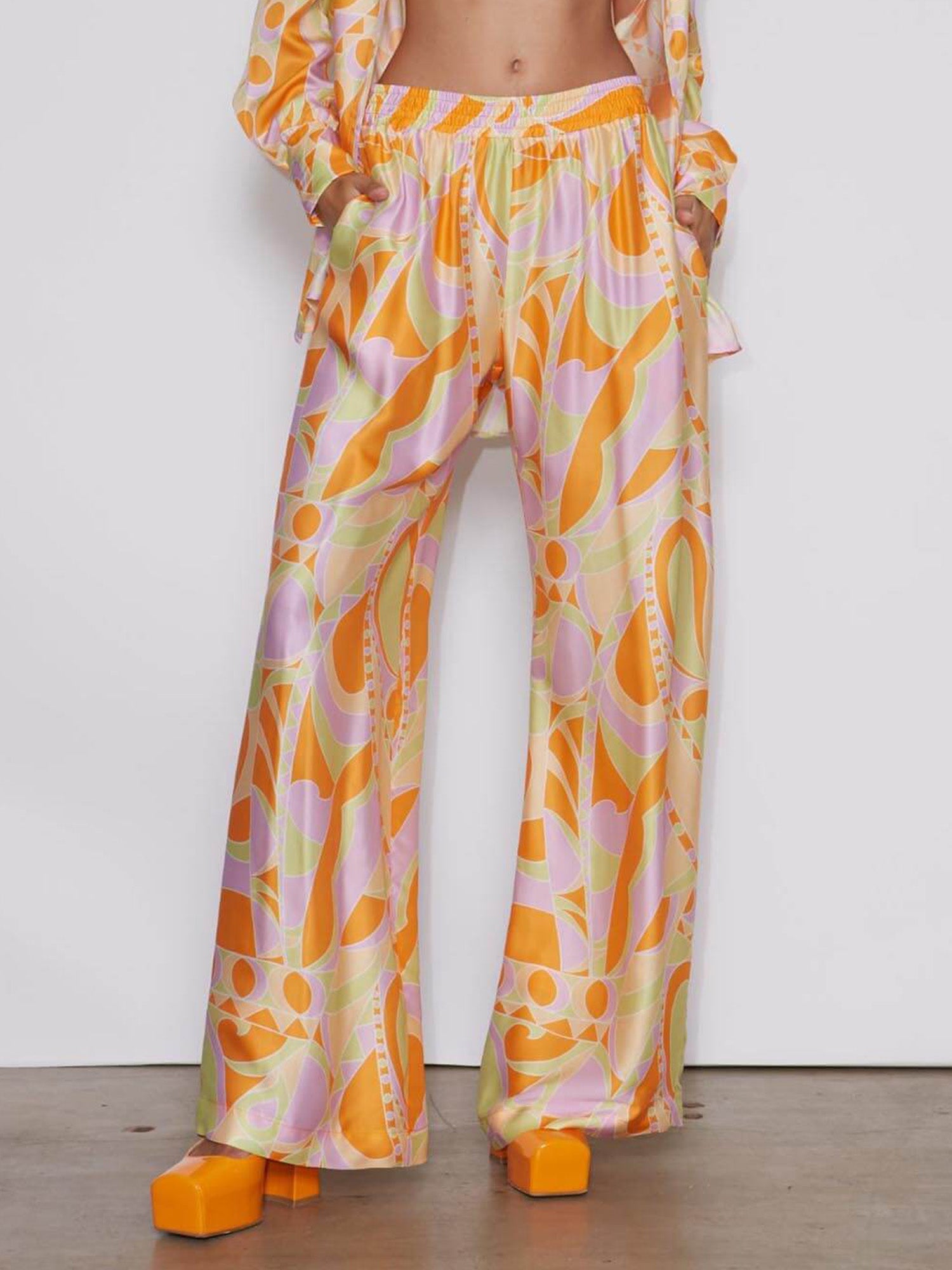Wide-leg trousers with tropical beach graphic print