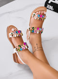 Yasmine - Flat white sandals with colorful rhinestones and a strap