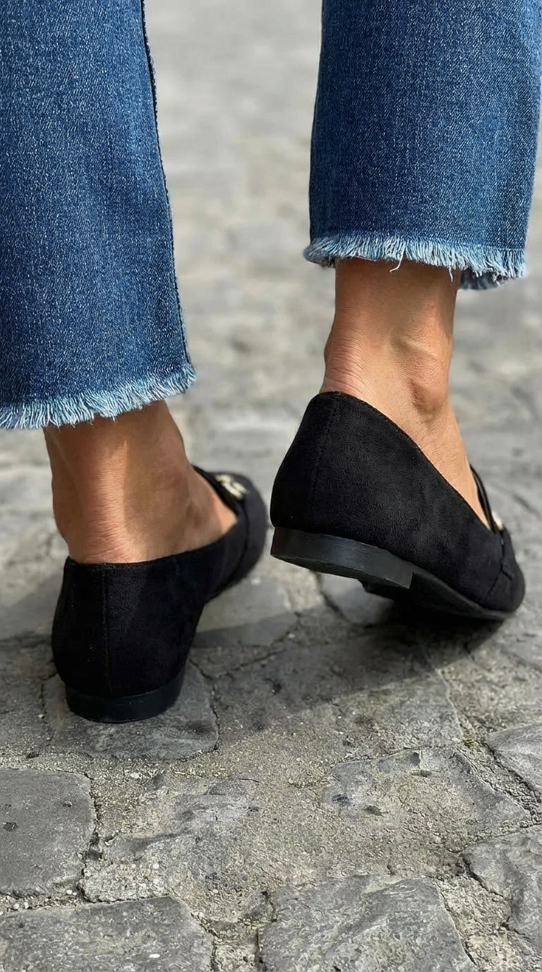 Black ballet flats with gold buckle
